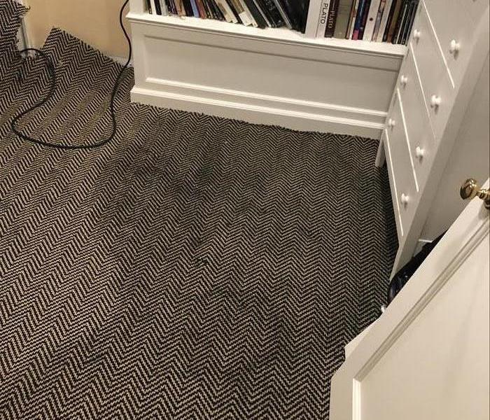 Water has affected carpet 