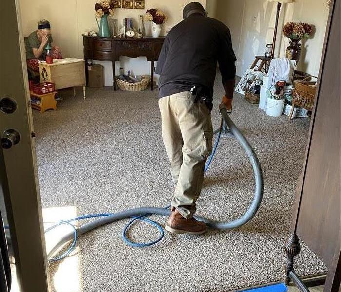 Carpet is being professionally cleaned 